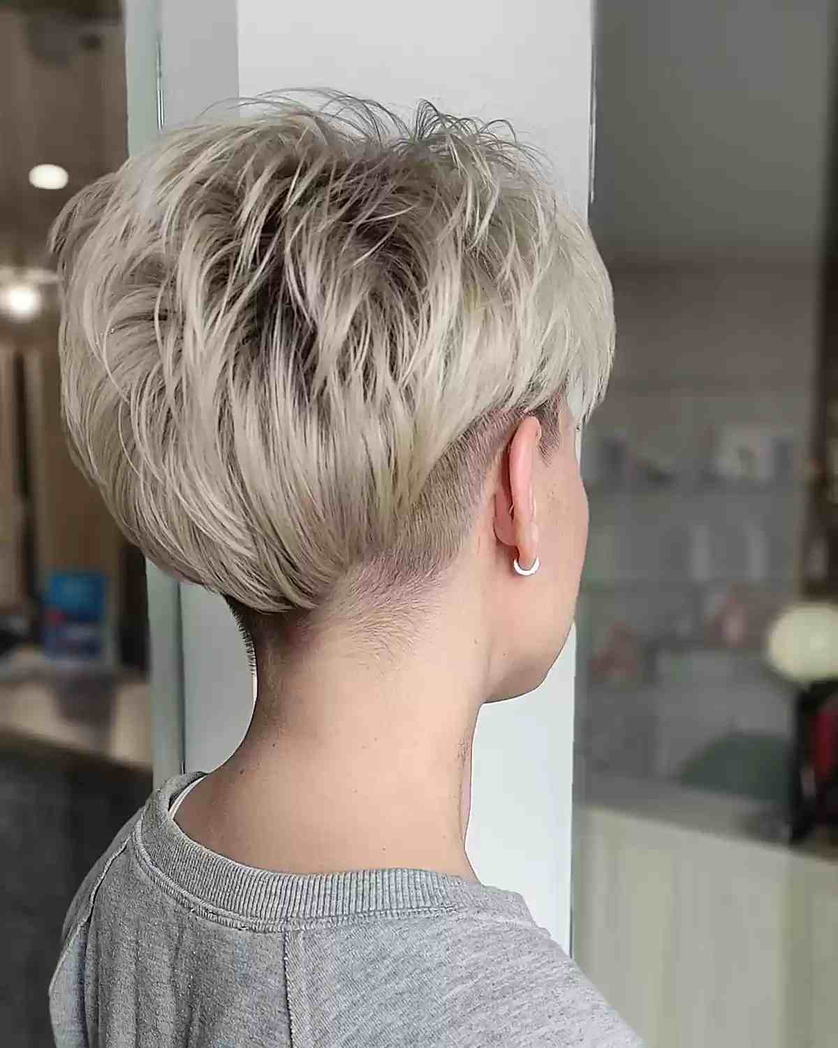undercut pixie cut with shaved nape