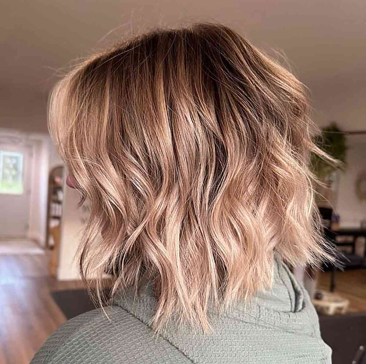 beachy blonde balayage bob with textured layers
