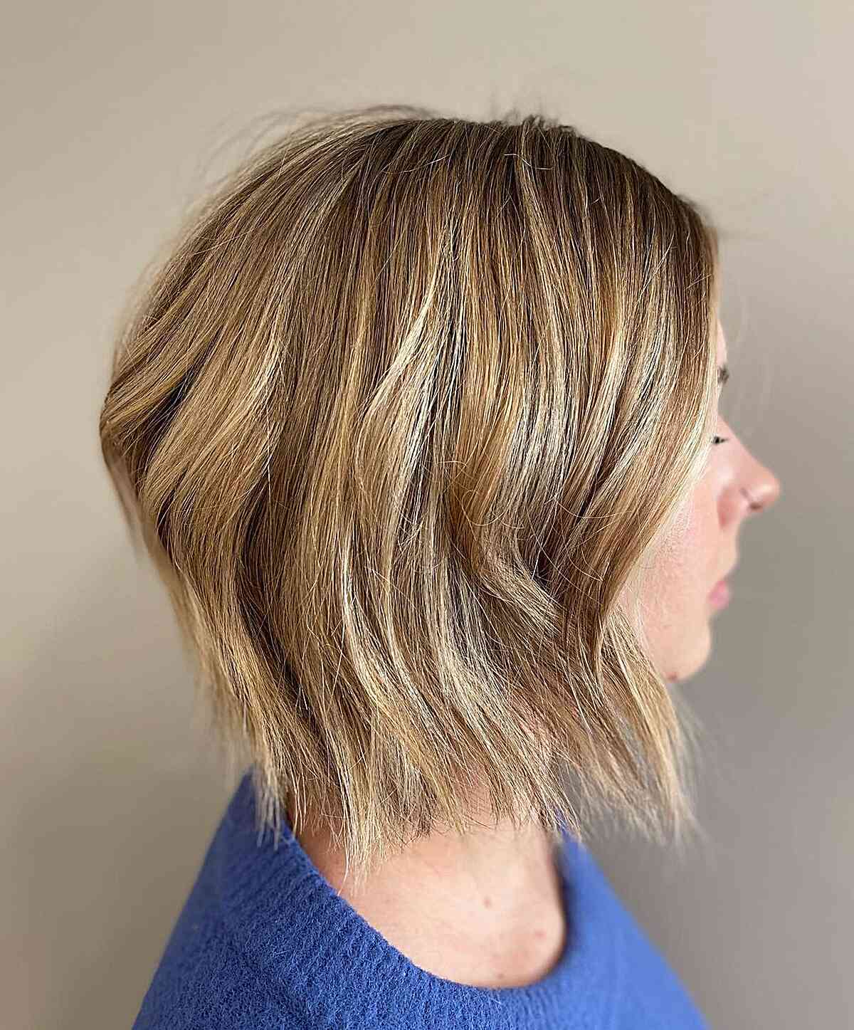 golden blonde textured bob with choppy ends