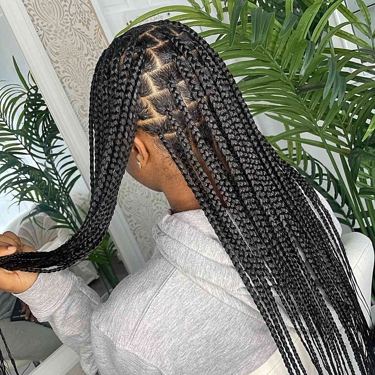medium sized knotless braids with sleek baby hairs