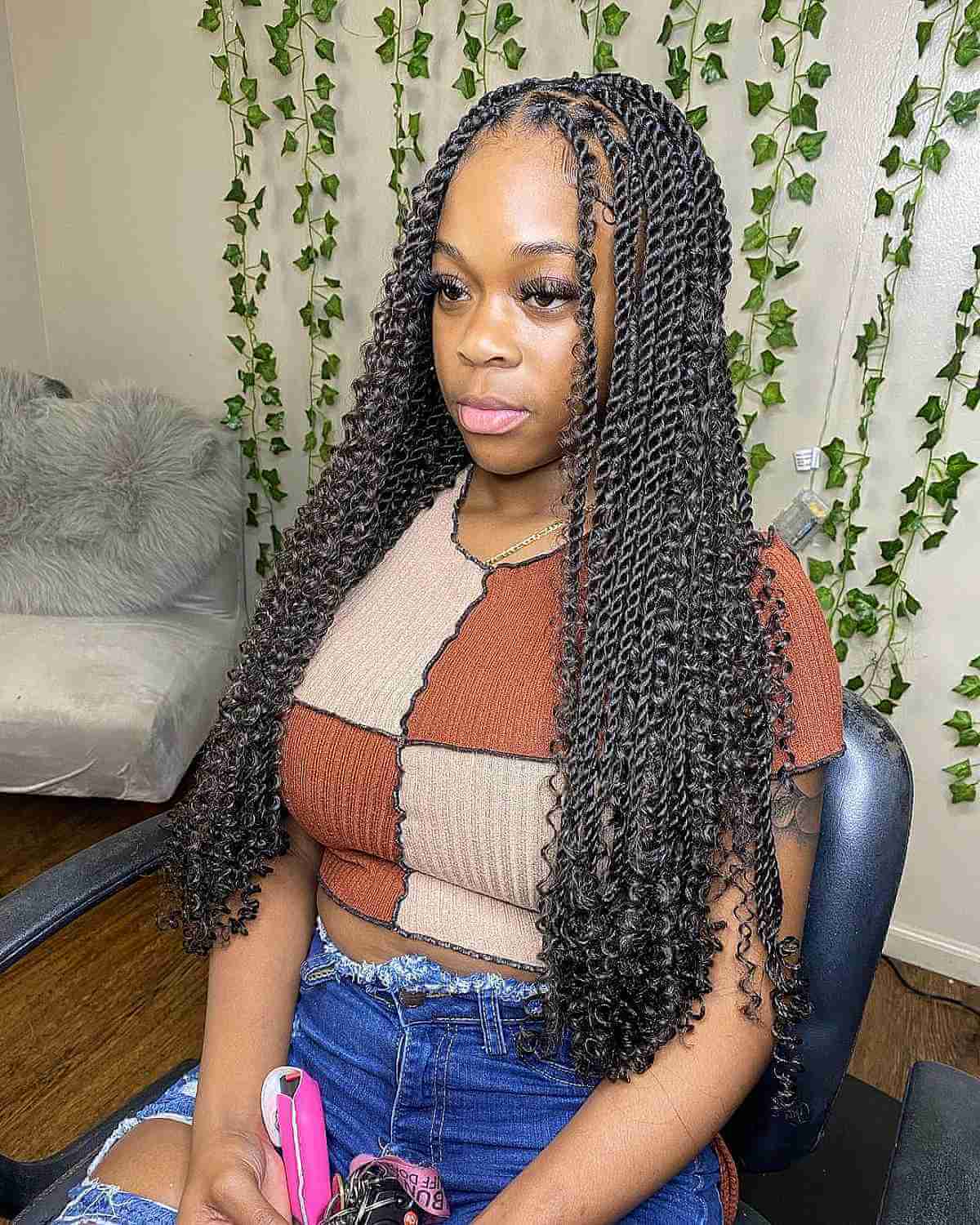 middle part knotless box braids with spiral ends