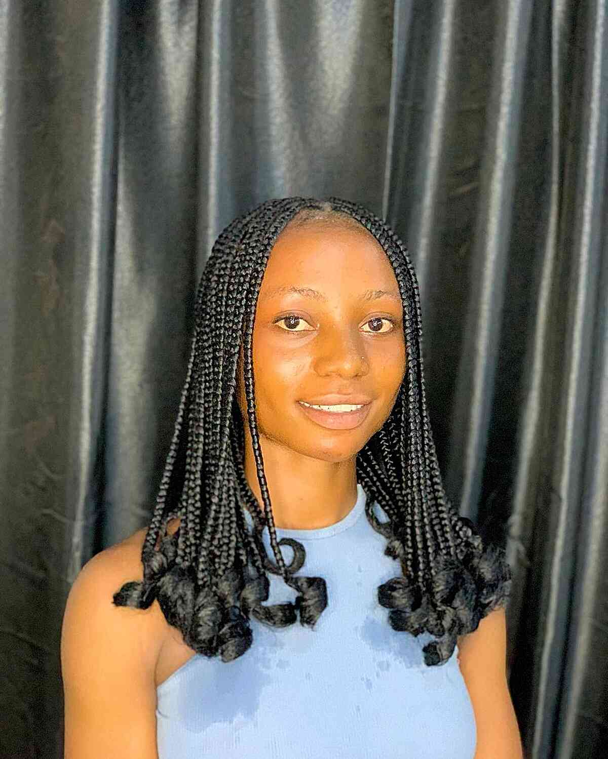 small knotless braids with curled ends for women