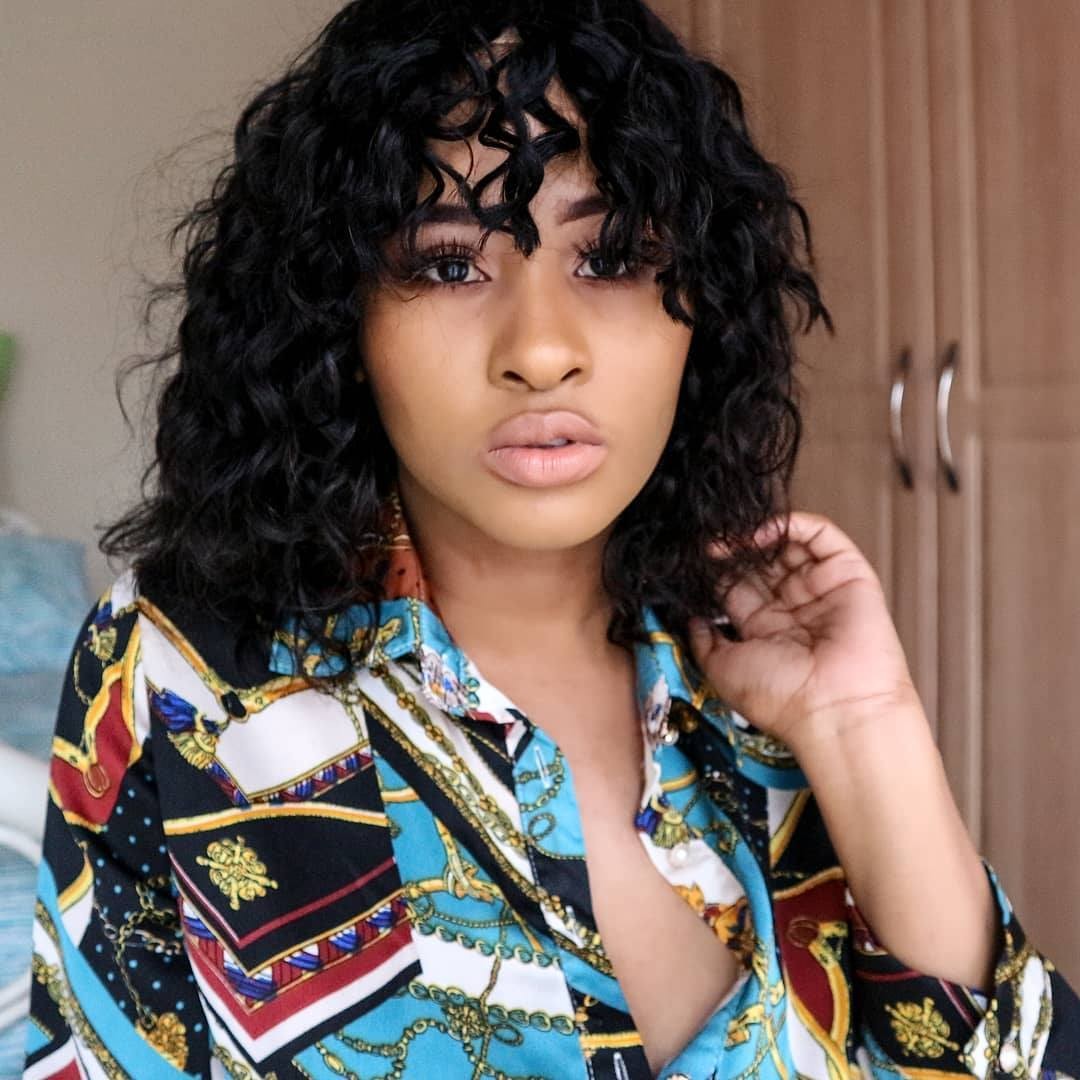 Curly Look With Peek A Boo Bangs