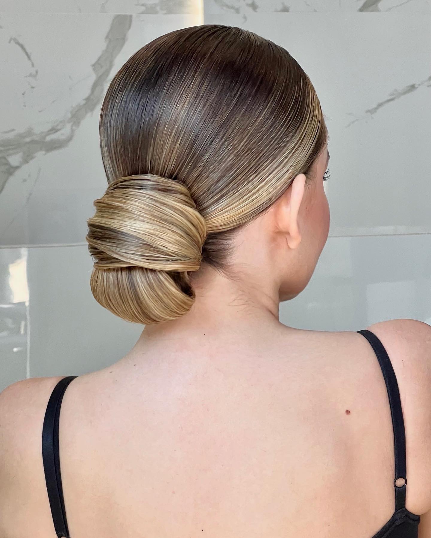 Formal Bun Sweat Friendly Hairstyle