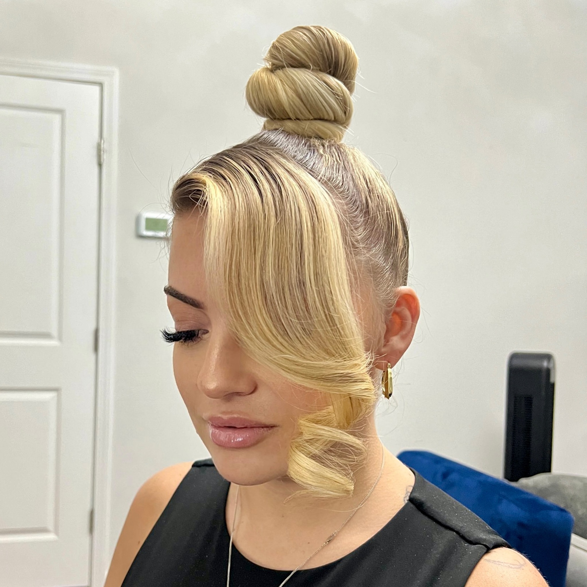High Bun Sweat Friendly Hairstyle