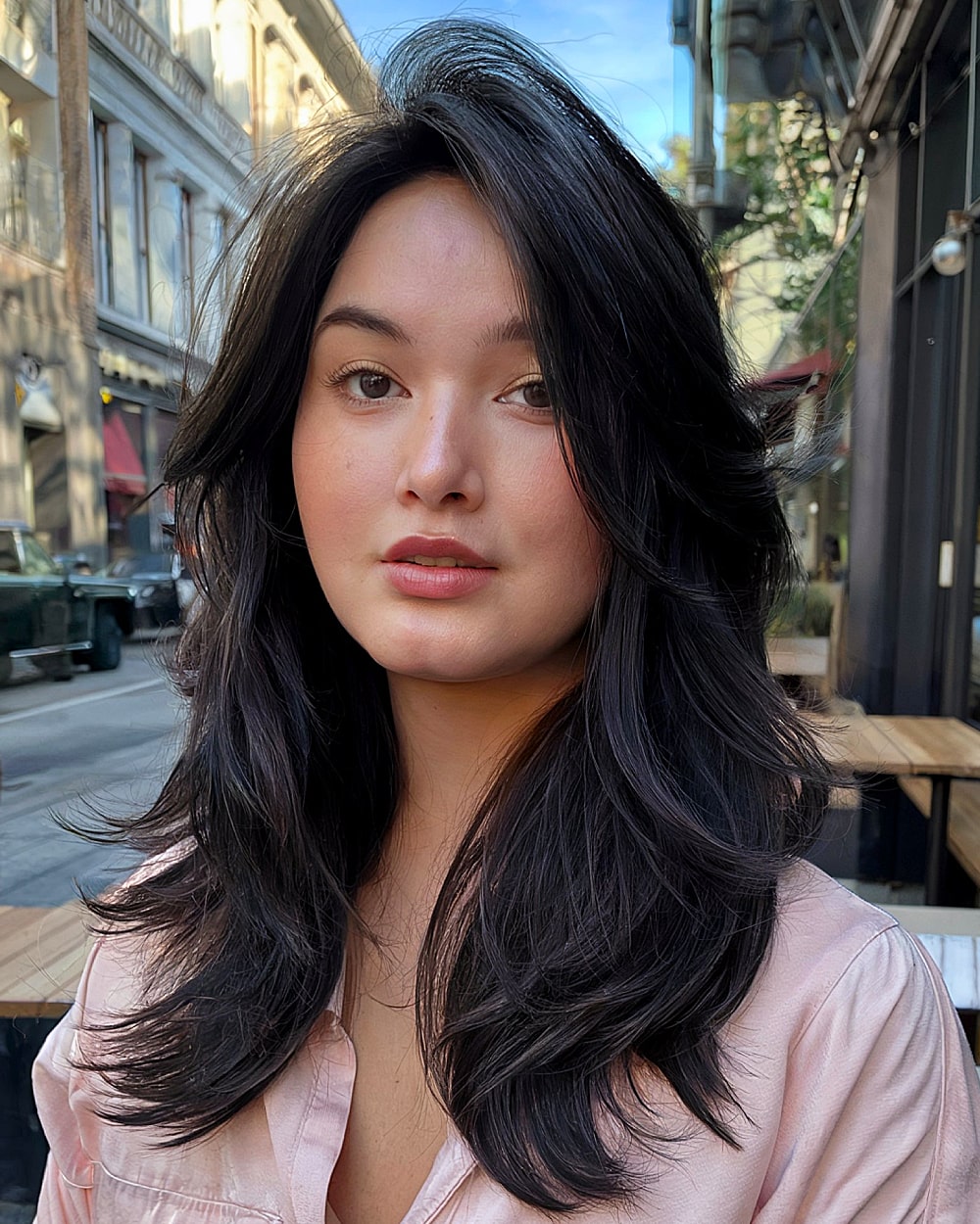 90s long layered hair flipped ends round face
