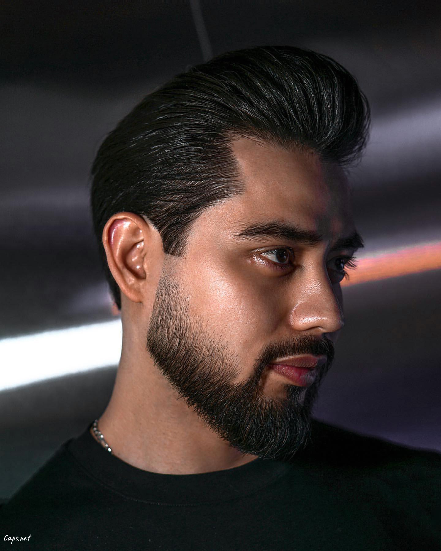 Slick Black Pompadour Hair