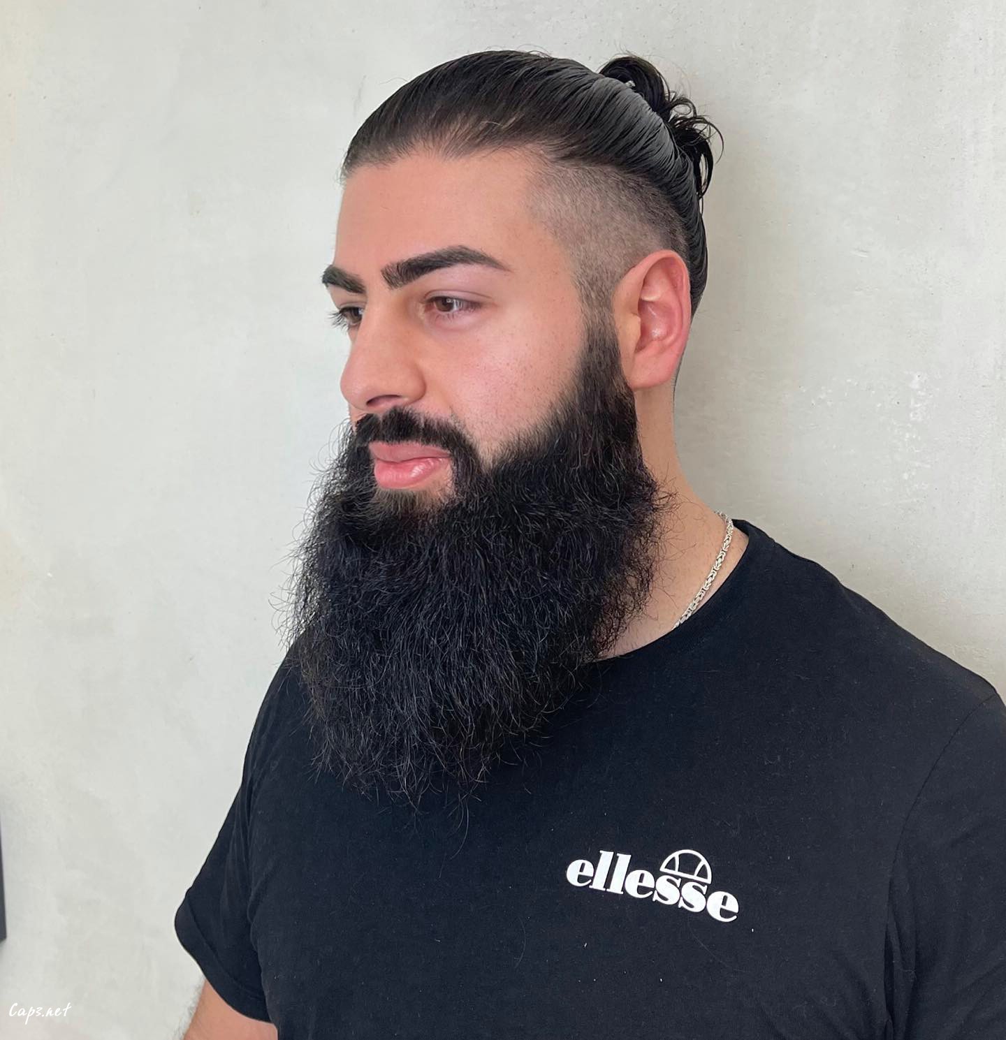 Slick Bun Long Hair With A Beard