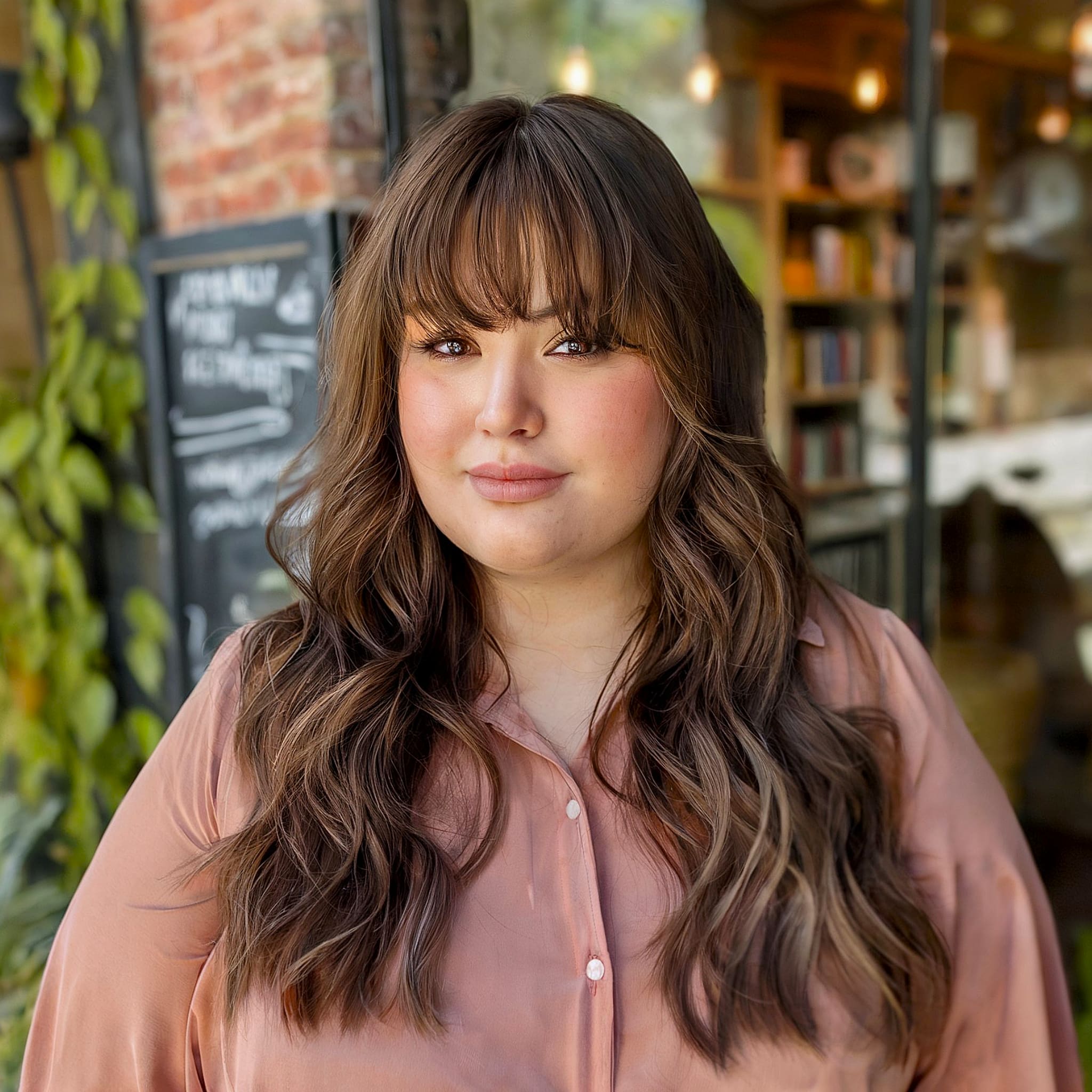 layered long hair with bangs round face