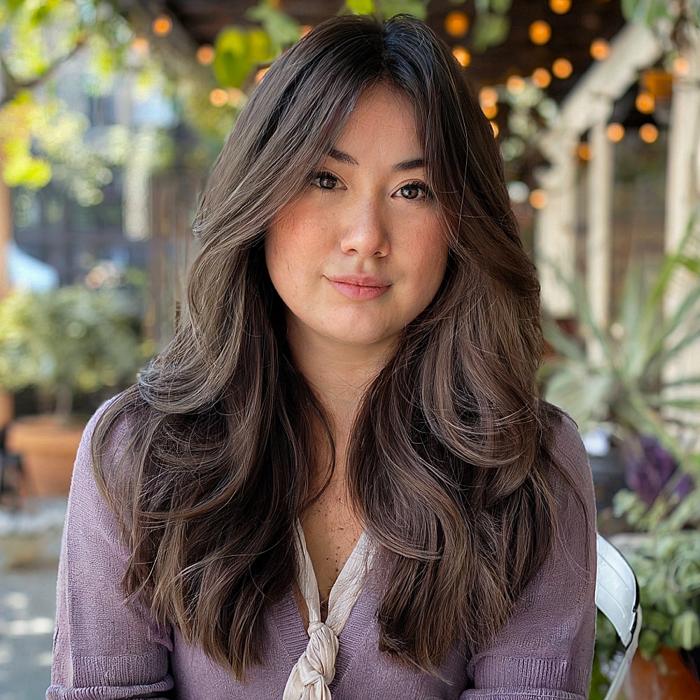 long hair with layers and curtain bangs round face