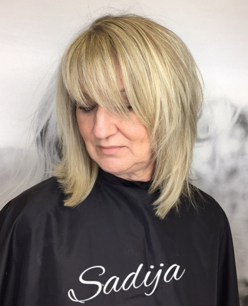 Layered mob with asymmetrical fringe