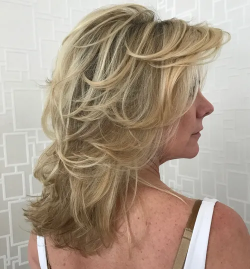 Long heavy feathered cut