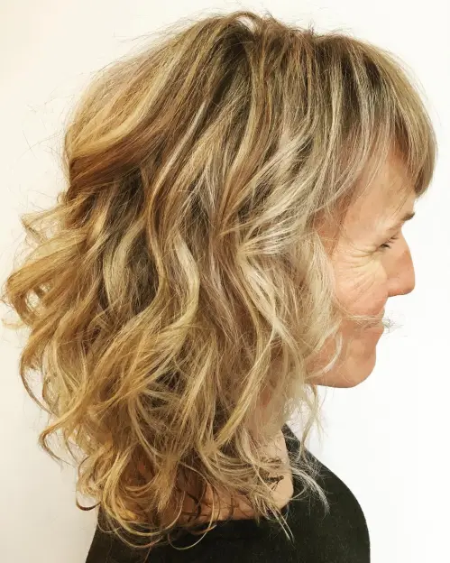 Medium cut with soft layered waves